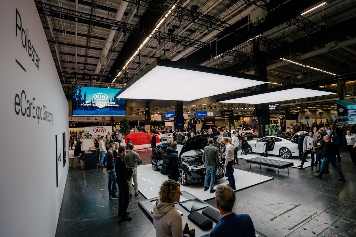 Event visitors inspecting Polestar cars at Ecar expo 2019.