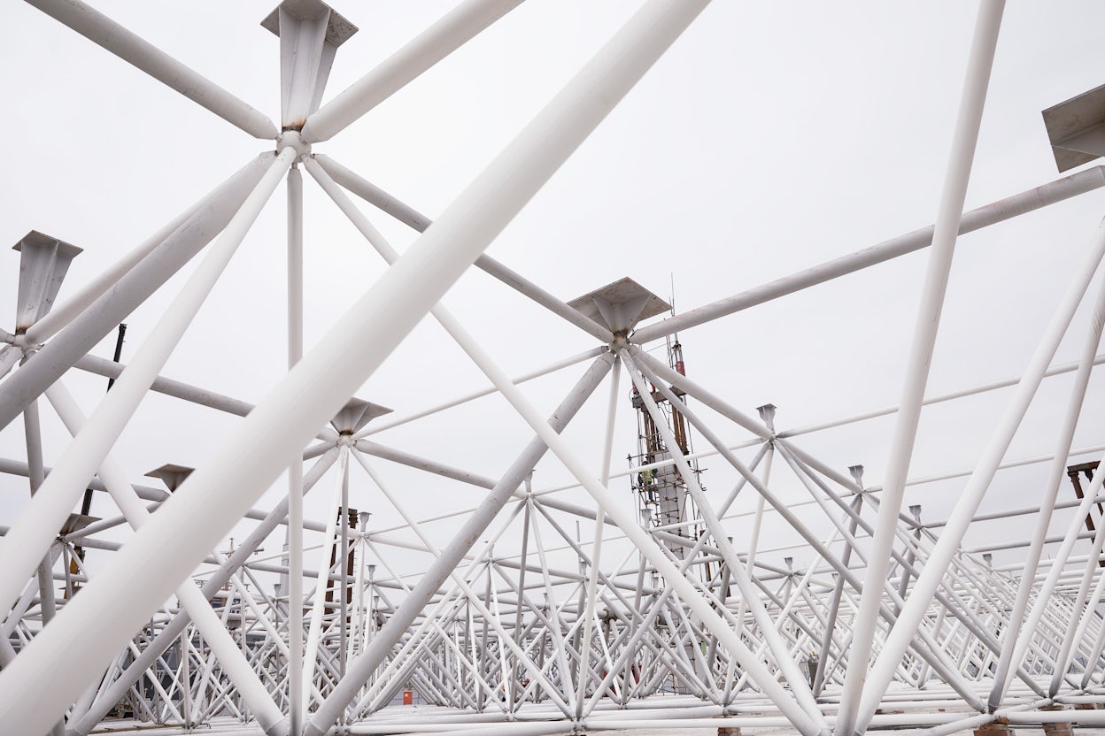 Metallic roof structure in white.