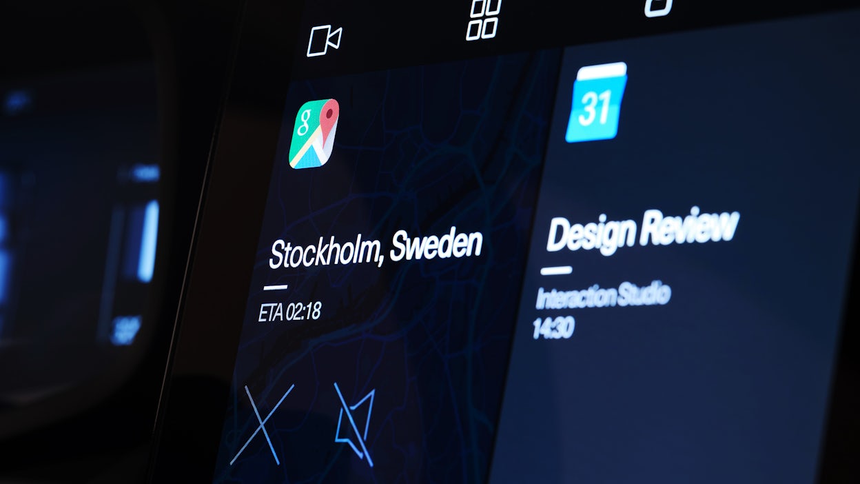 A close-up of a in-car display that reads Stockholm Sweden ETA 02:18.