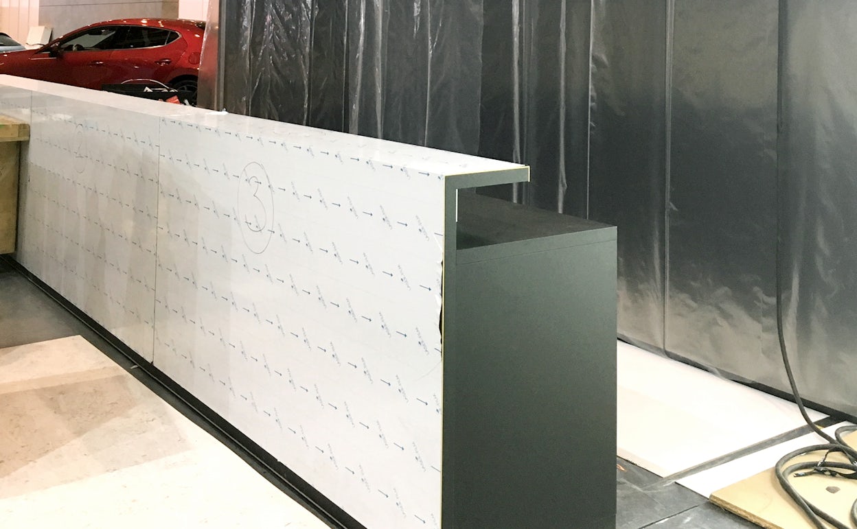 Reception desk under construction.