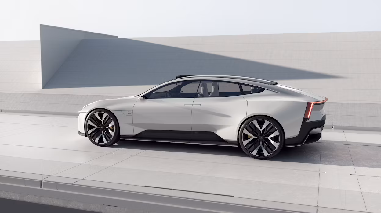 Side view of a grey Polestar parked in a grey space.