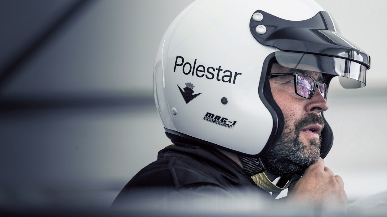 Joakim Rydholm wearing a Polestar racing helmet.