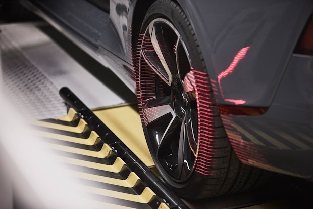 Details of the car tire on a grey polestar 2
