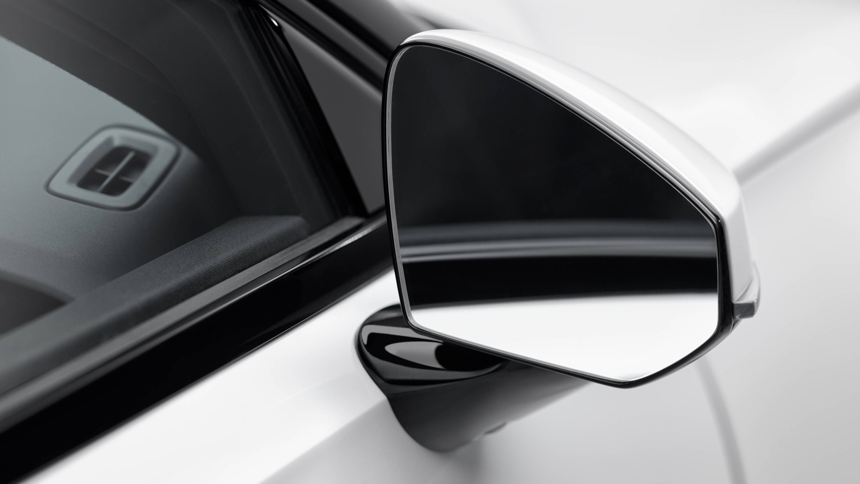 Polestar 2's frameless mirror design.
