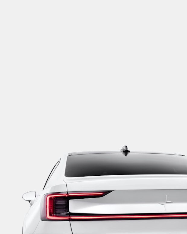 Close-up of the rear of a Polestar 2 in Snow color