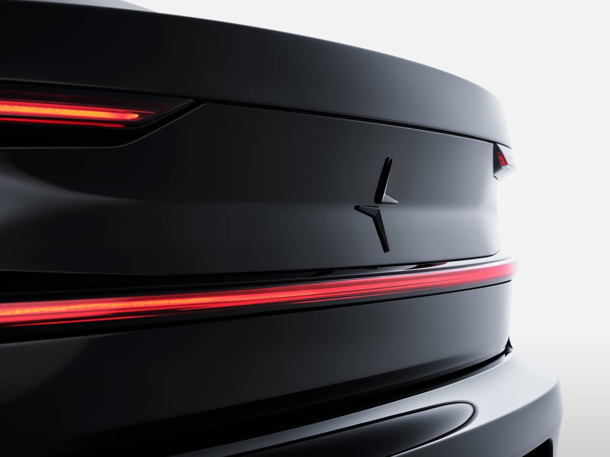 Polestar logo on the back of a black Polestar 2.