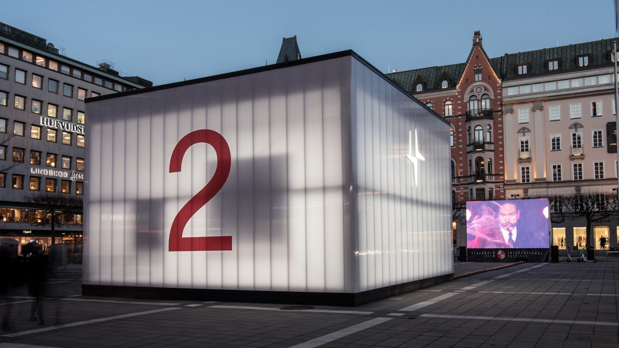 The Polestar cube in Norrmalmstorg with a prominent number 2 showing on one of the sides.