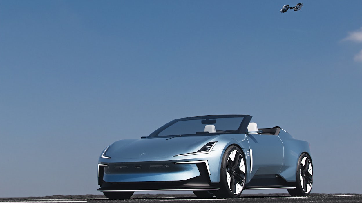 Polestar o2 parked with blue sky and drone in background