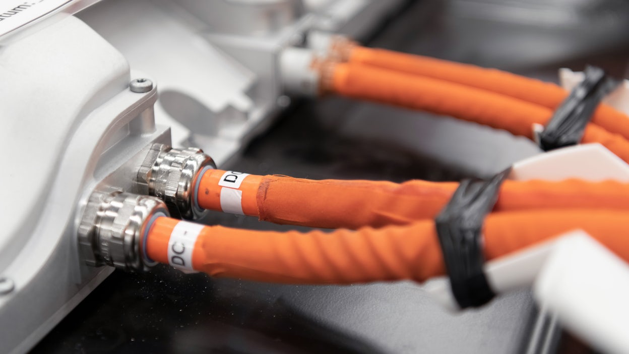 Close-up of cables attached to a Polestar battery.