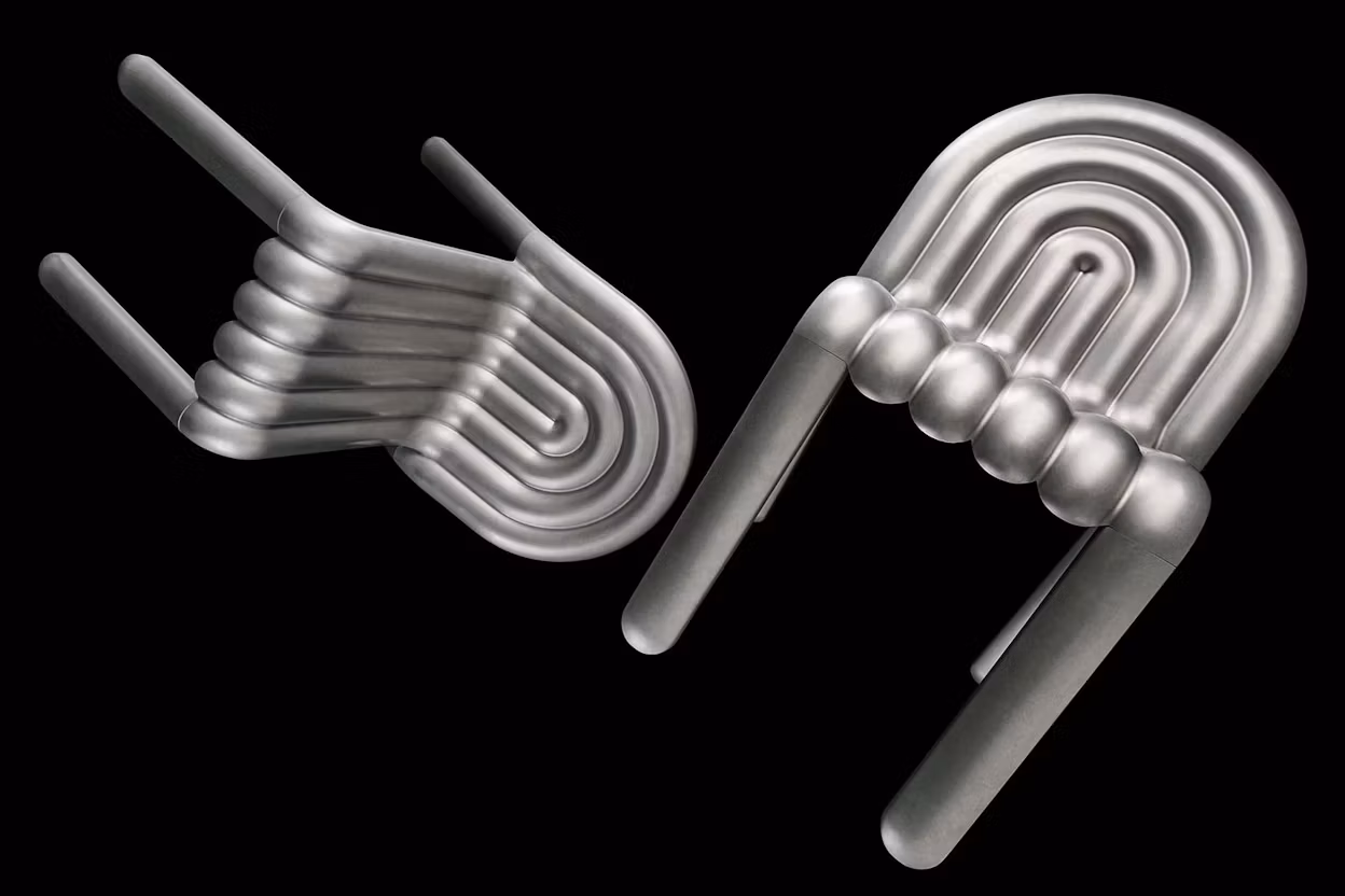 Image of two aluminium chairs.