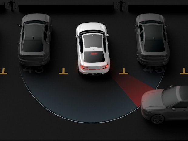 Visualisation of Cross Traffic Alert. White car reversing from a parking spot whilst another is passing behind.