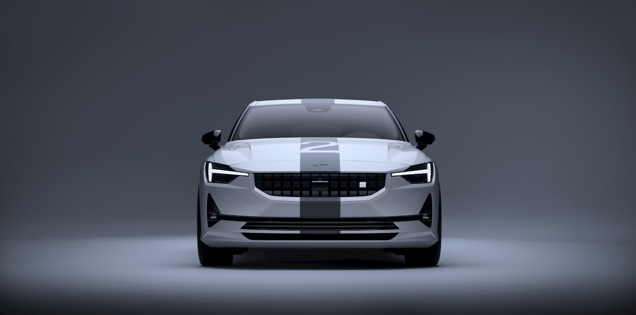 A white Polestar 2 featuring a racing stripe.