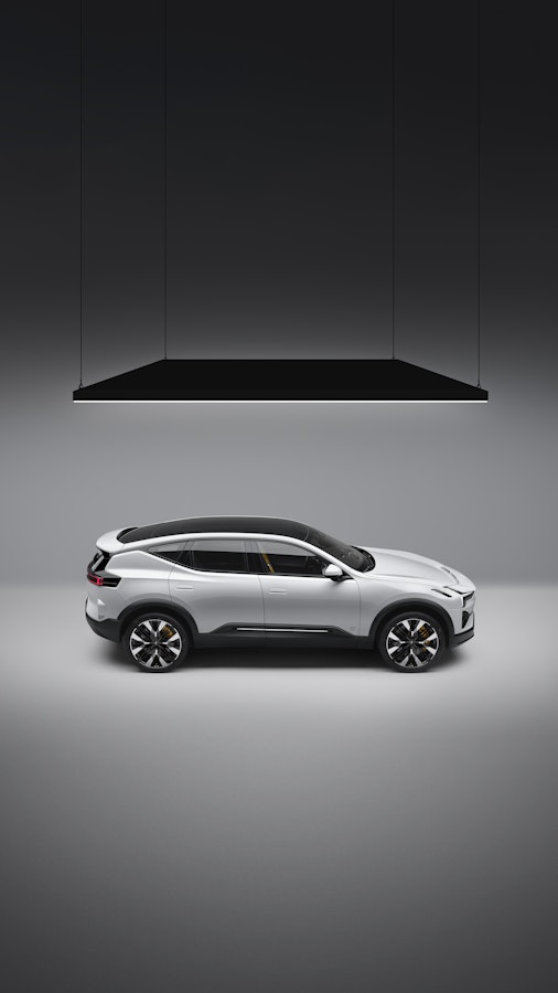 White Polestar 3 standing under spotlights