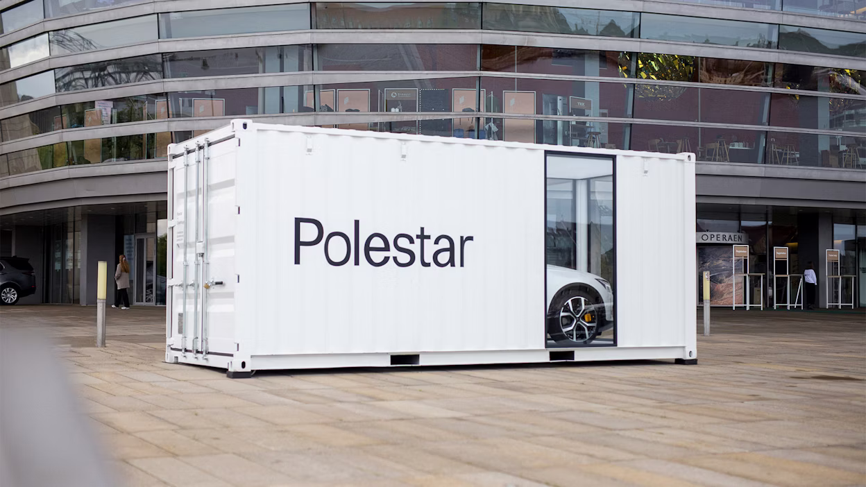 A Polestar displayed inside a container at the Global Fashion Summit.
