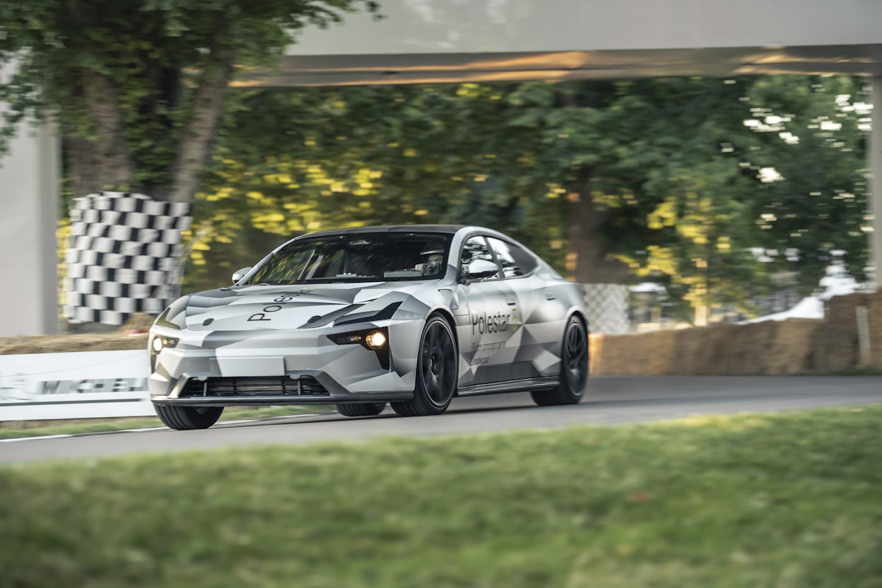 A camouflaged Polestar 5 prototype on The Goodwood Hillclimb.