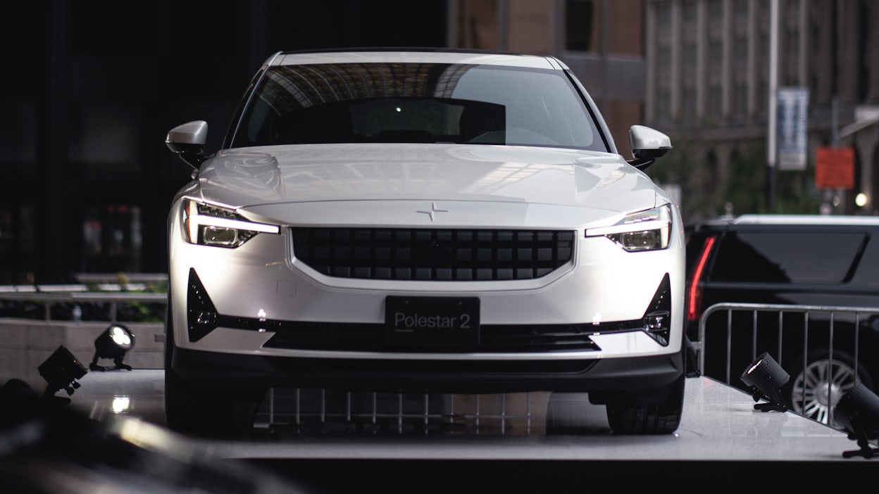 A white Polestar 2, seen from the front.