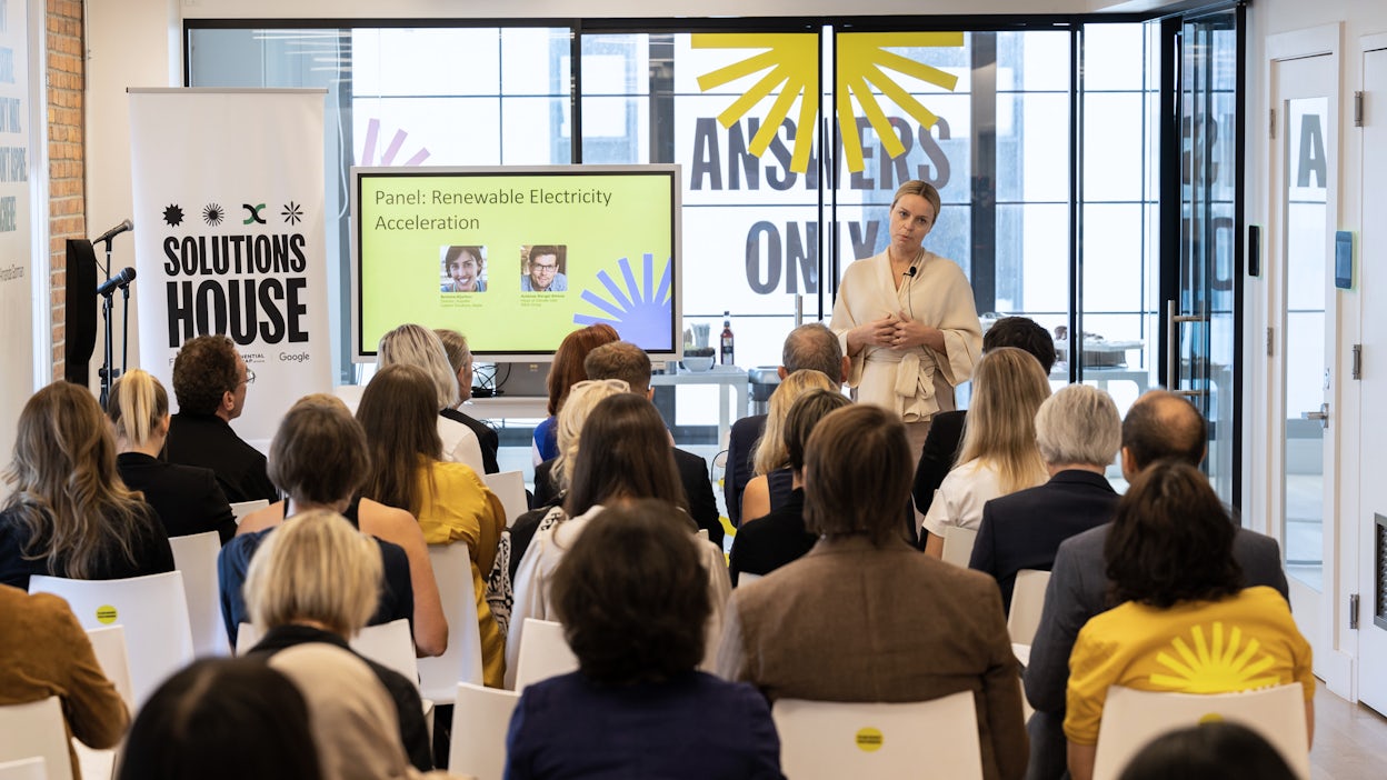 Fredrika Klarén speaking in a brighly coloured room at New York Climate Week