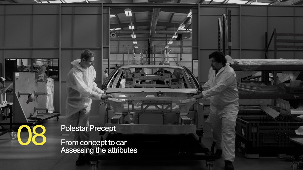 A Polestar car being assembled at a production facility.