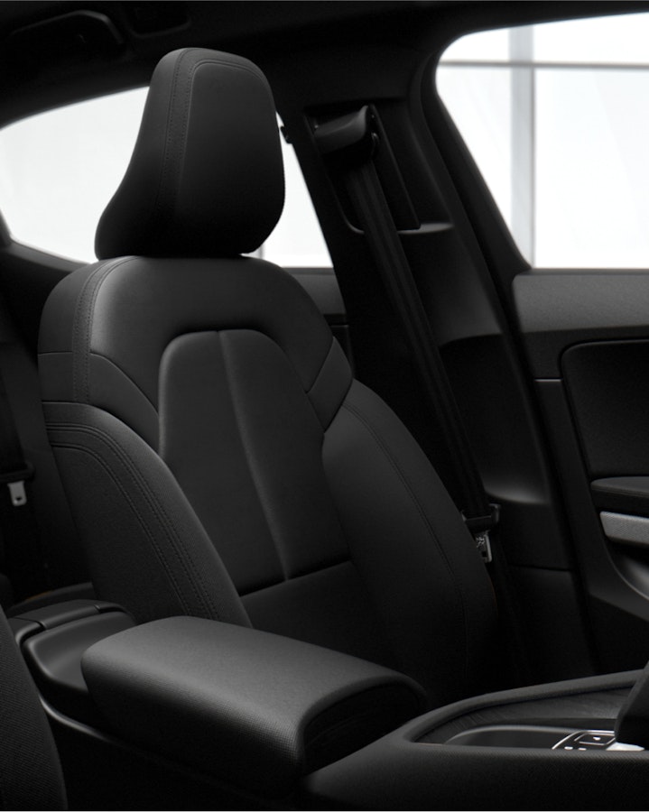 Black seats inside the Polestar 2. Dark interior.