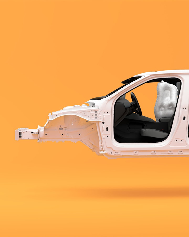 Orange background and white frame of the Polestar 2. Airbags deployed