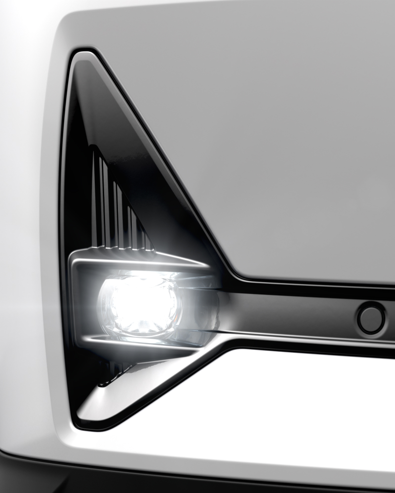 Close-up in the LED front foglights on a white Polestar 2