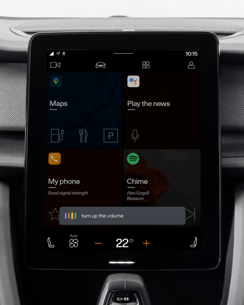 Center console showing a pop up with turn up the volume activated by voice recognition.
