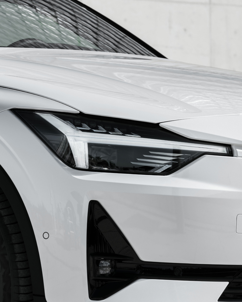 Close-up on the headlights on a white Polestar 2