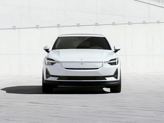 Polestar 2 front view with SmartZone in focus parked in a light concrete setting