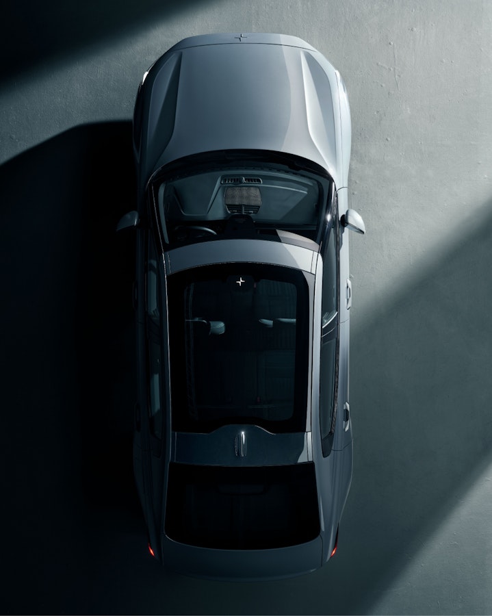 A blue Polestar 2 from above.