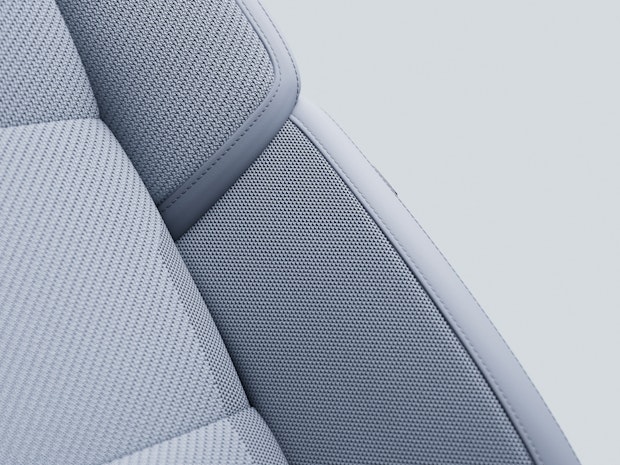 Angled detail of Polestar 4 front seat backrest with Tailored knit upholstery