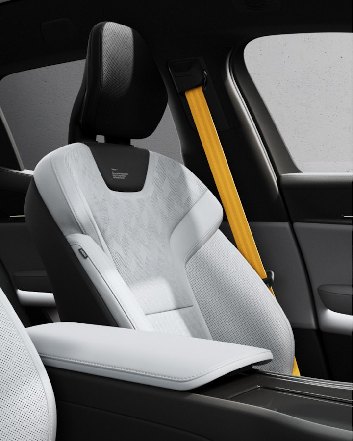 Polestar 3 interior, side view of front and back seats and signature seatbelts.