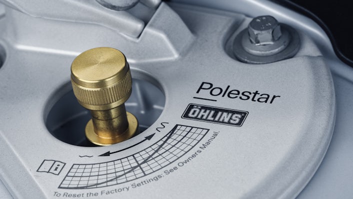 Golden knob of Öhlins dampers allowing you to choose your own suspension settings.