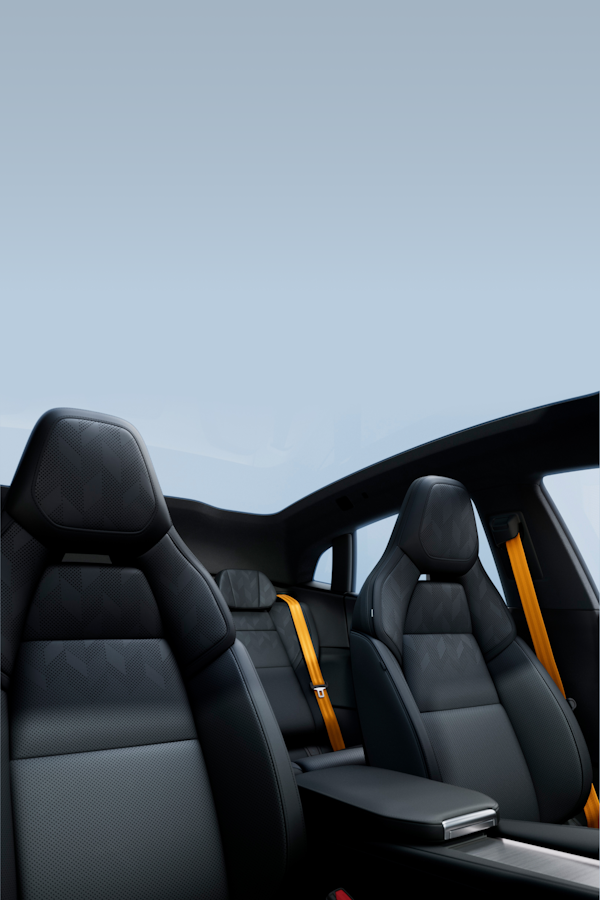 The interior of Polestar 4. Dark interior and large skylight