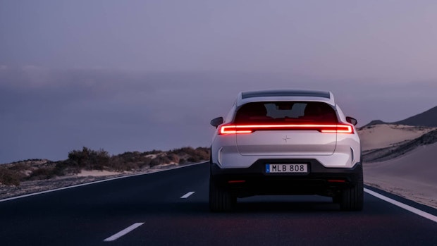 Rear-view of a white Polestar 3 in motion