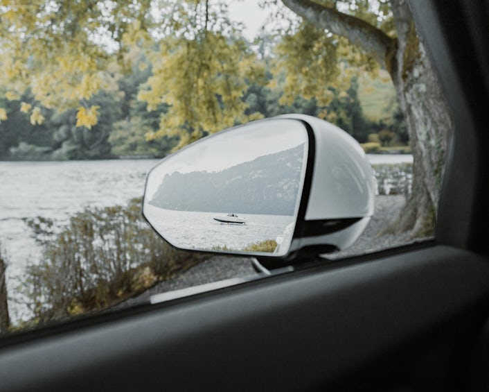 Boat reflection in car mirror