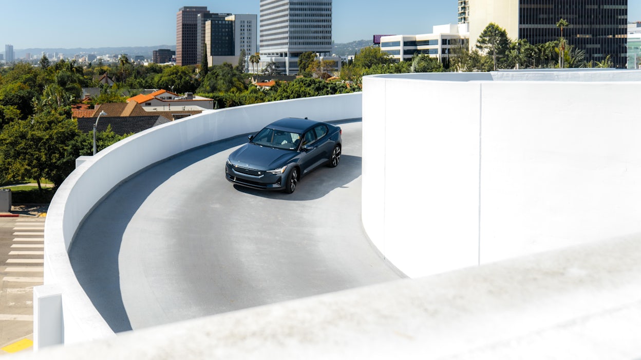 Polestar 2 driving down a parking garage in Los Angeles.