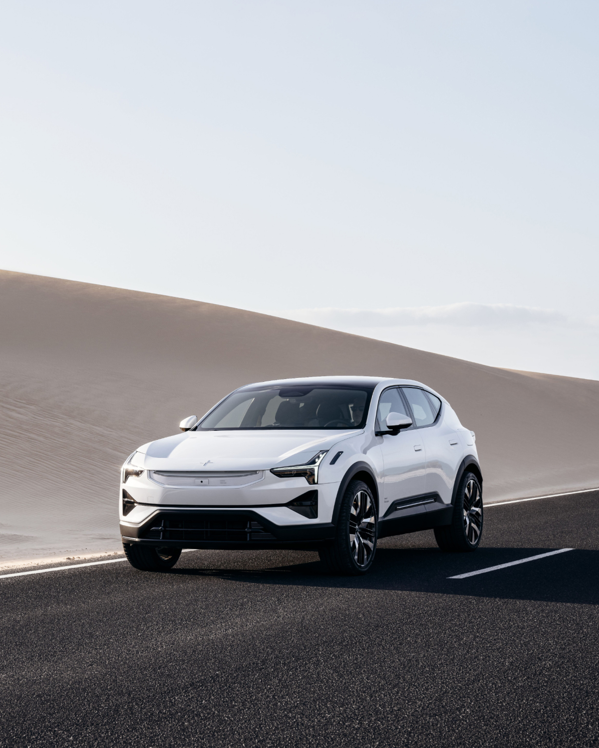 White Polestar 3 standing on a road in a desert