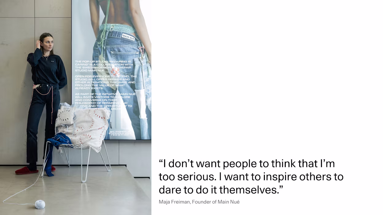 Maja Freiman standing infront of a sign inside the Polestar Space which explains the event purpose.