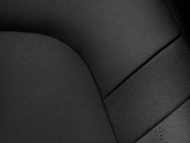 Up-close image of black WeaveTech upholstery.