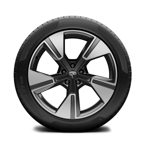 Polestar car wheel with five-spoke design and black tire.