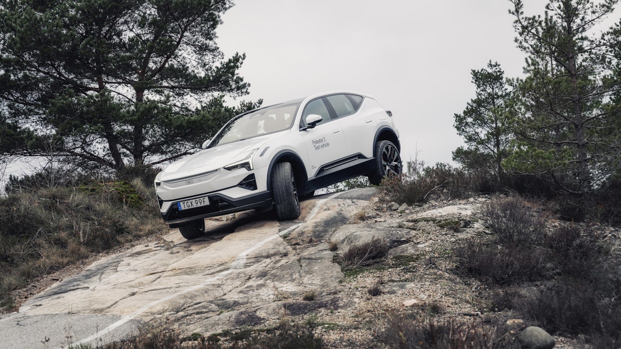 Polestar 3 prototype driving off-road.