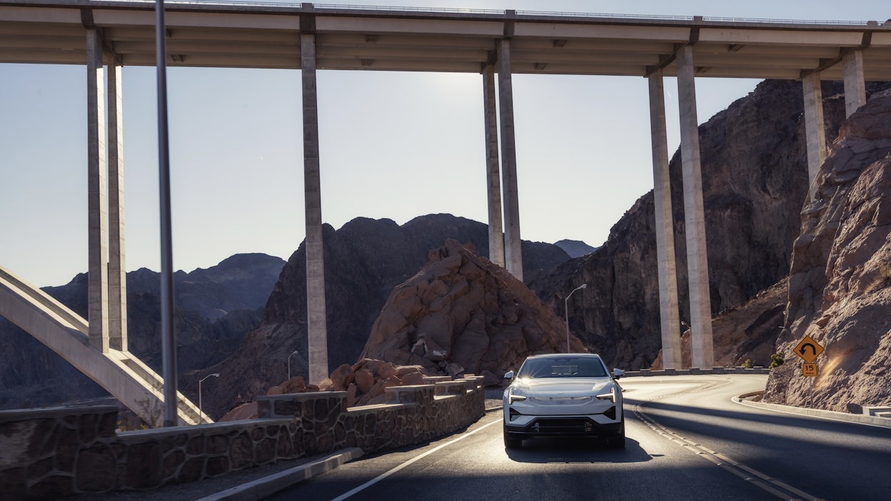 Polestar 3 driving under a bridge