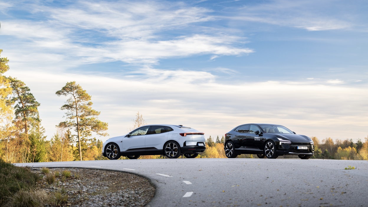 Two polestar 4s parked side by side on country road