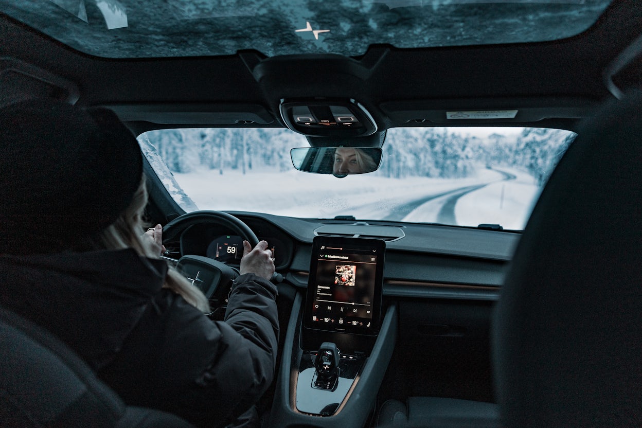 Tanja driving her Polestar 2, listening to christmas music.