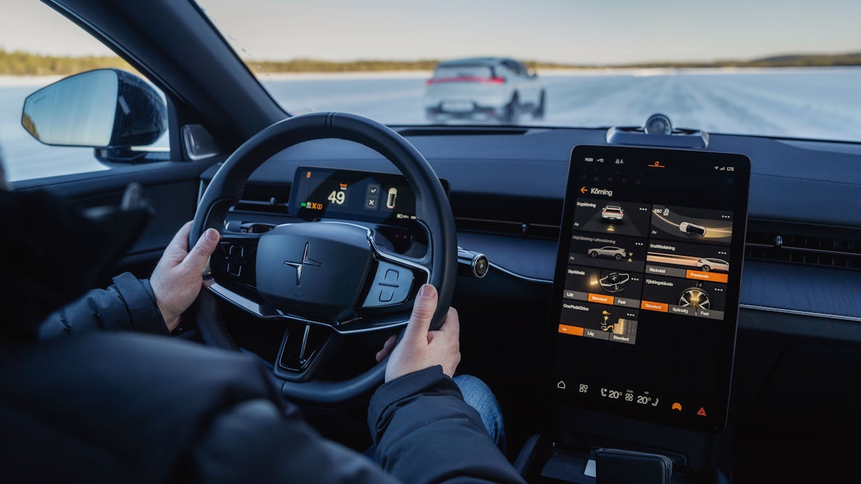 In the Polestar 3 driver's seat on the road.