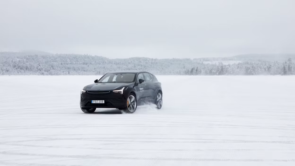 Polestar 3 in Space colour driving on track on ice.