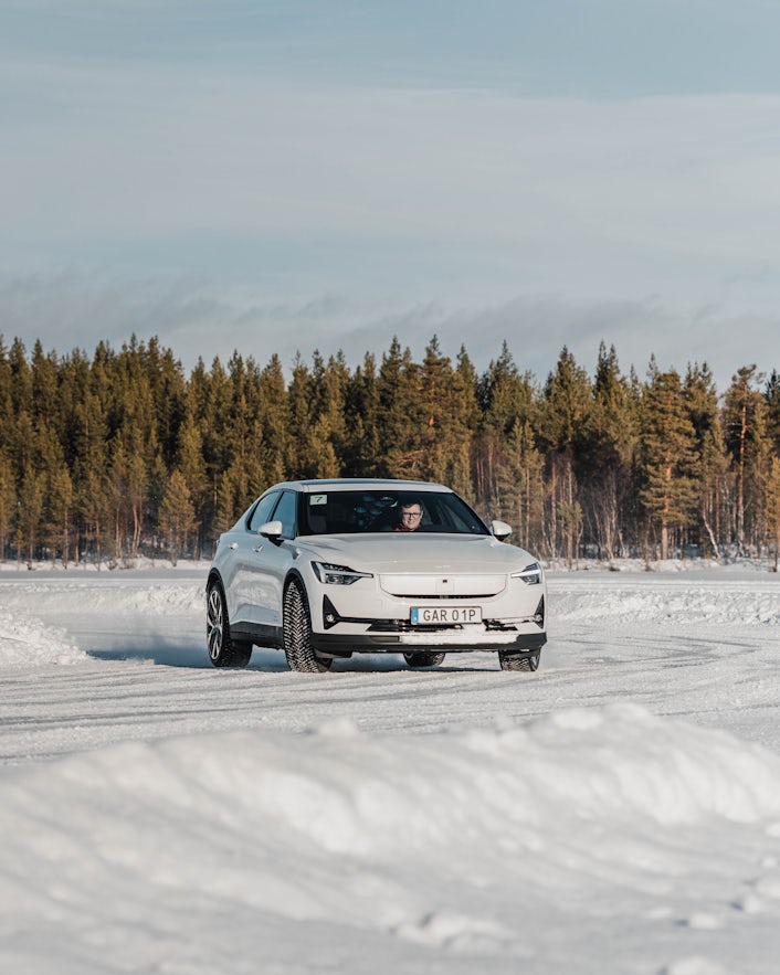 Gordon Murphy driving a Polestar 2 in the Polestar Arctic Driving Experience.