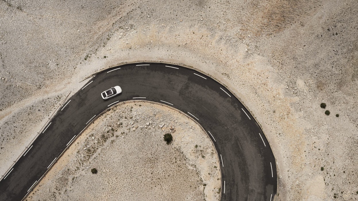 Aerial view of Polestar taking tight corner