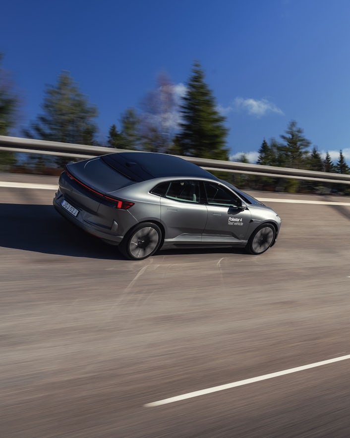 Polestar 4 rear driving on track.