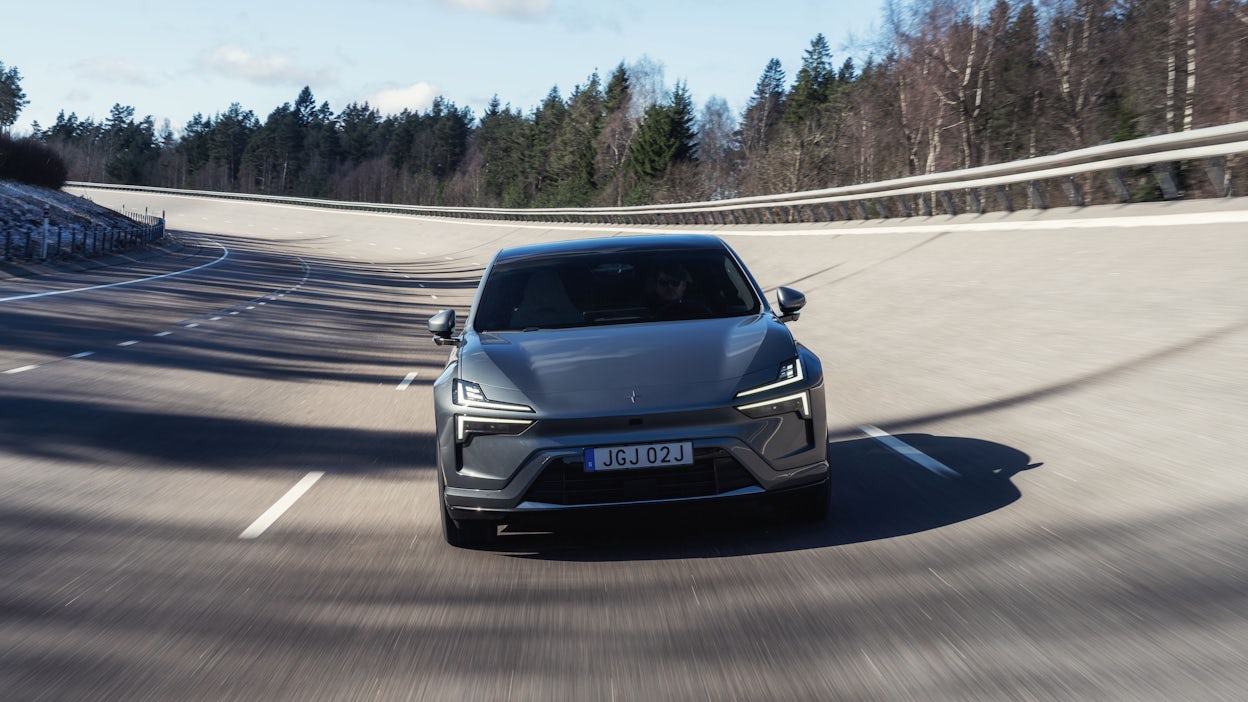 Front facing Polestar 4 driving on track